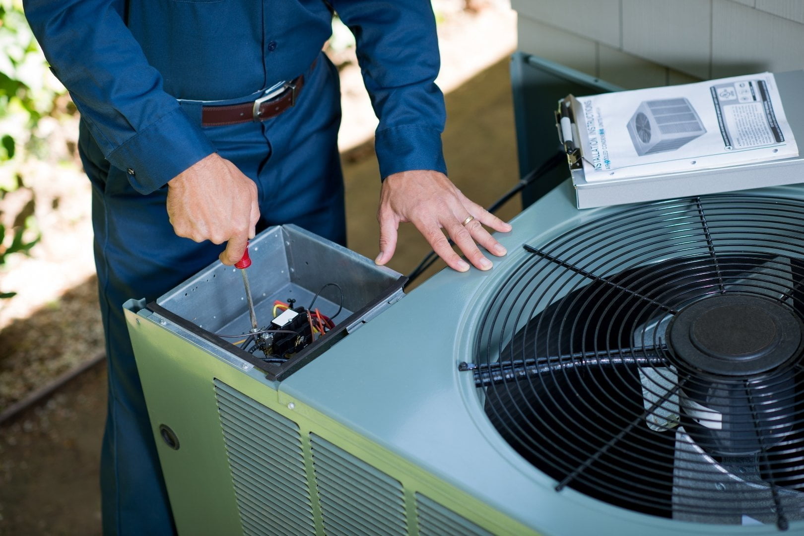 A man providing air conditioning services.