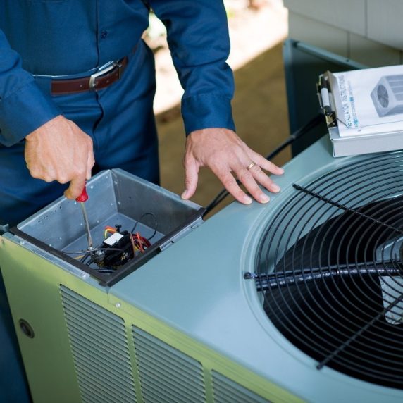 A man providing air conditioning services.