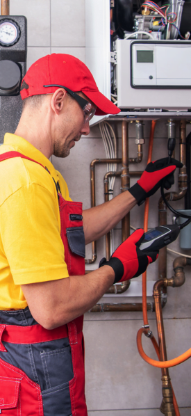 A Kennesaw HVAC Company technician doing some repair services.