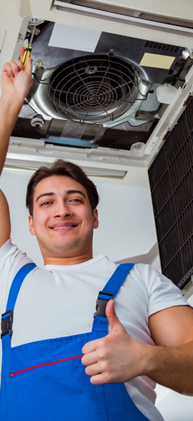 A man representing Smyrna HVAC Company is holding up an air conditioner.